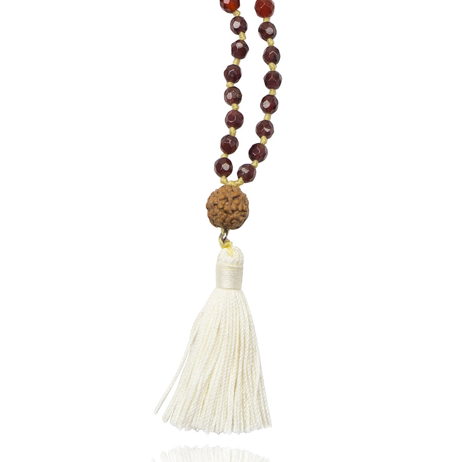 Rudrakhsa bead with white tassle on Seven Chakra Short Mala Baby Necklace on white background