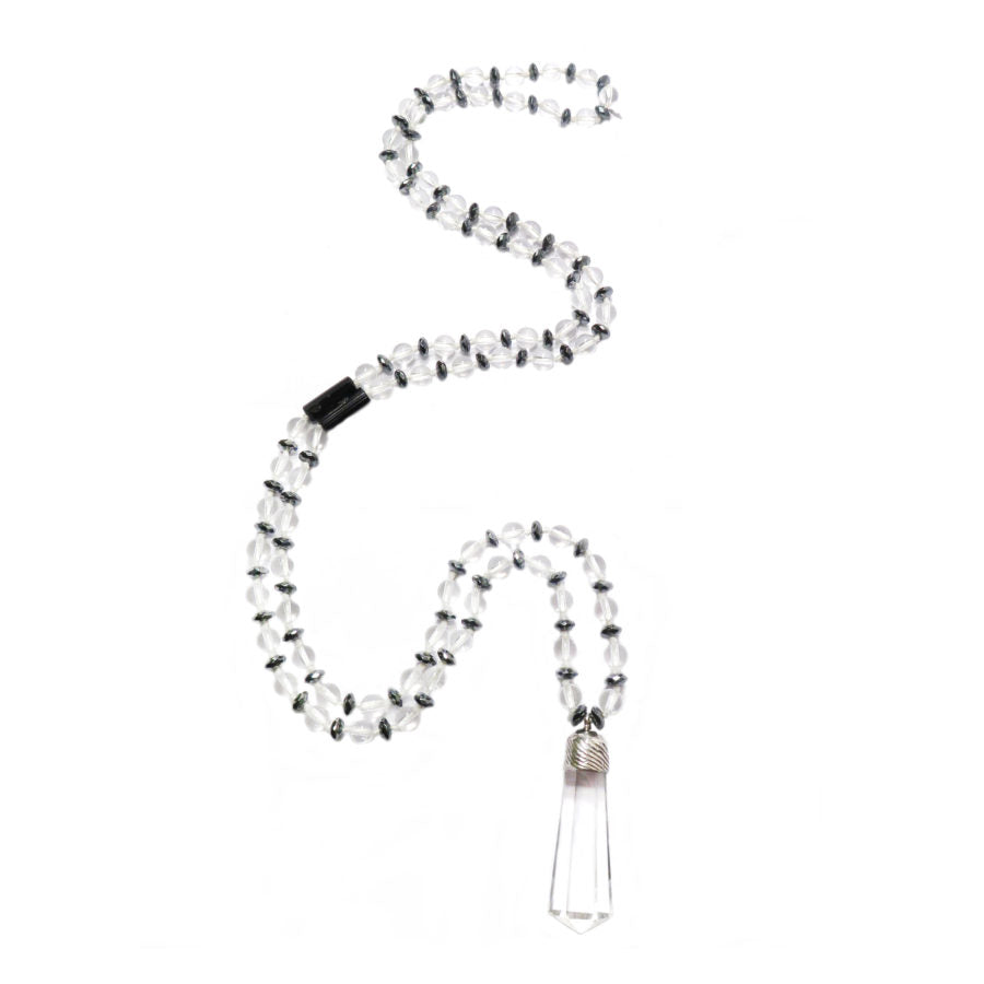 Crystal with black tourmaline and hematite Connecting To Source Mala Necklace on white background