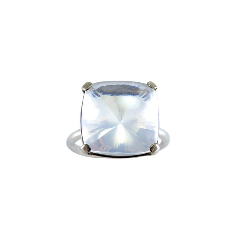 milky crystal stone of a silver ring on white background