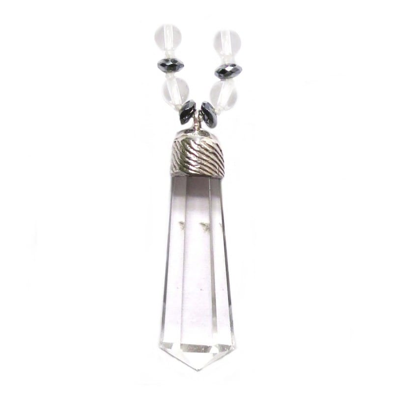 Crystal pendant of a mala necklace on white background