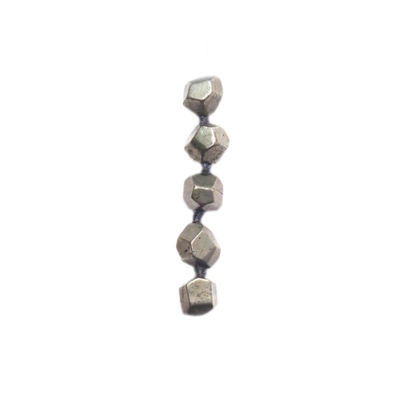 a row of pyrite beads of a silver bracelet on white background