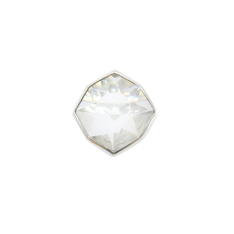 octagon shape crystal of a silver ring on white background