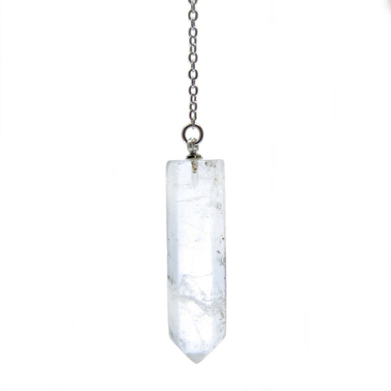 a raw crystal clear quartz of a crystal pendulum on white background