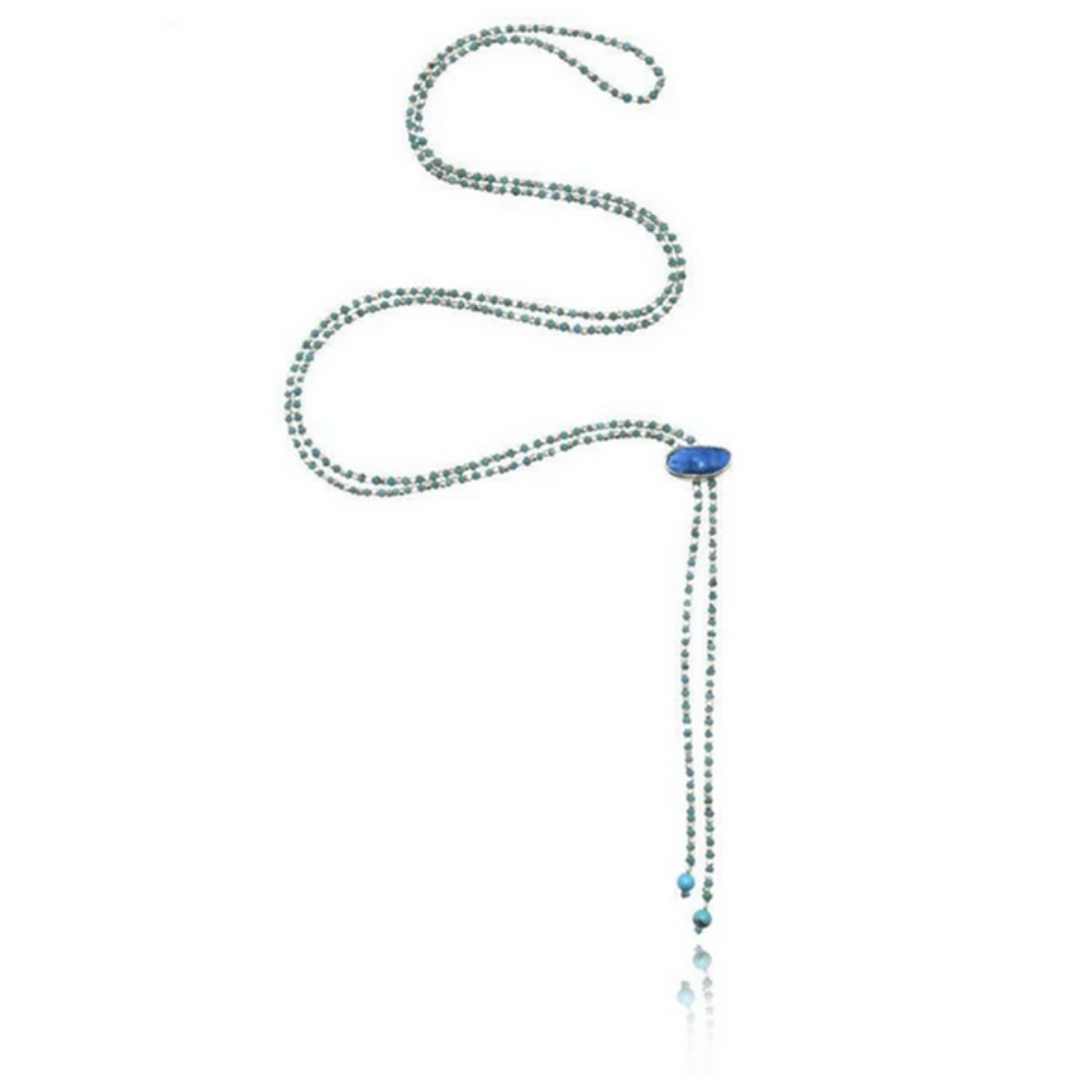 long necklace with Turquoise beads and Thai Silver beads and Hemimorphite pendant on white background