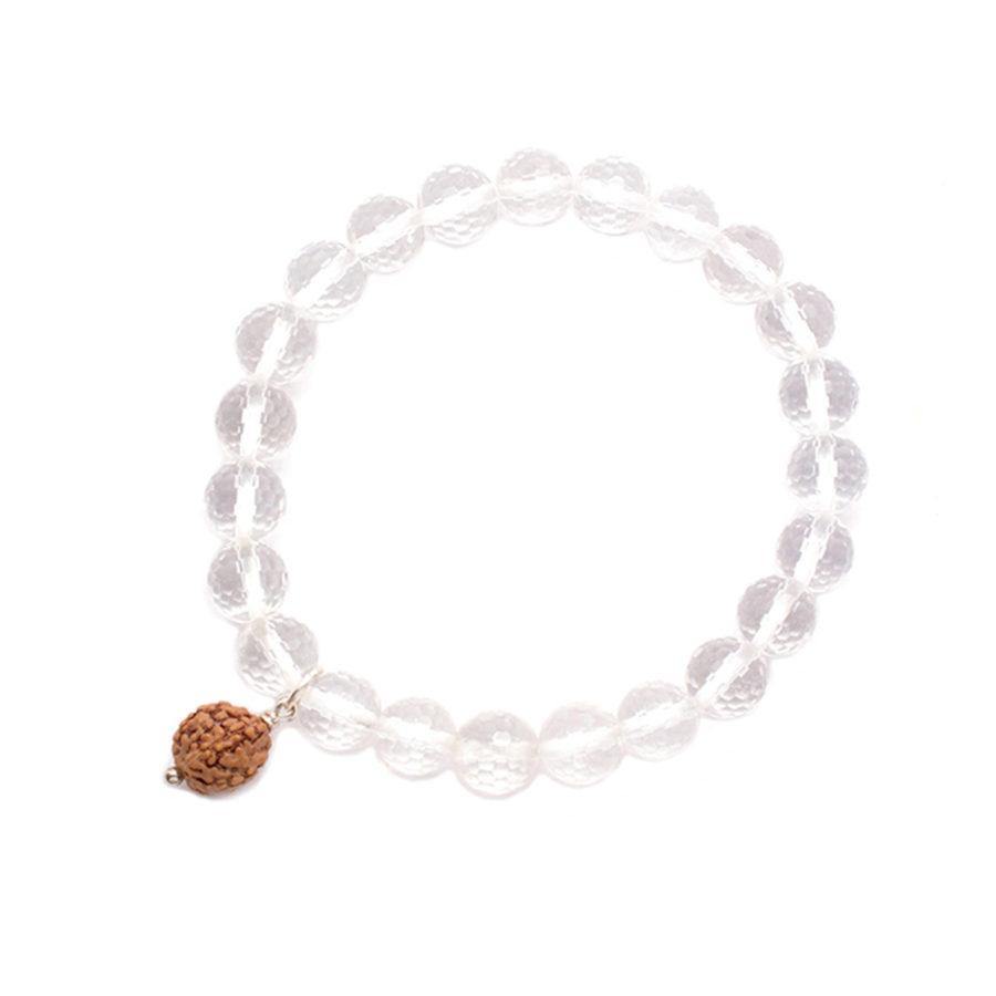 elastic bracelet with 8 mm faceted crystal quartz and a rudraksha bead centerpiece on white background 