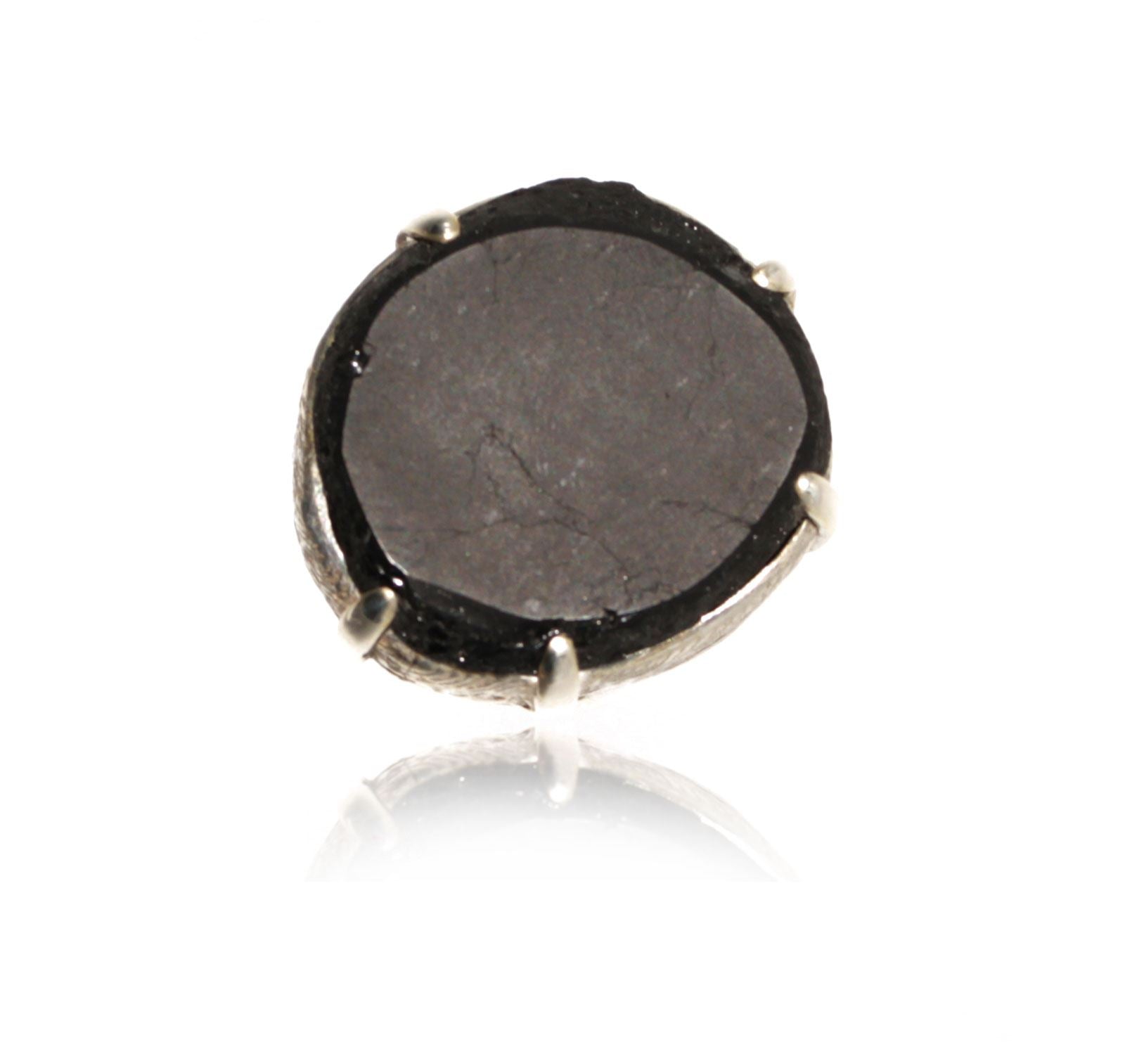 silver ring with black tourmaline top view on white background