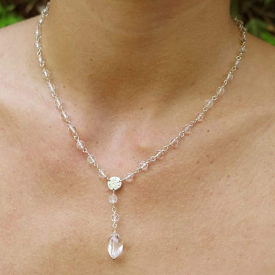 Vibrational Healer Short Necklace with crystal clear drop pendant on model