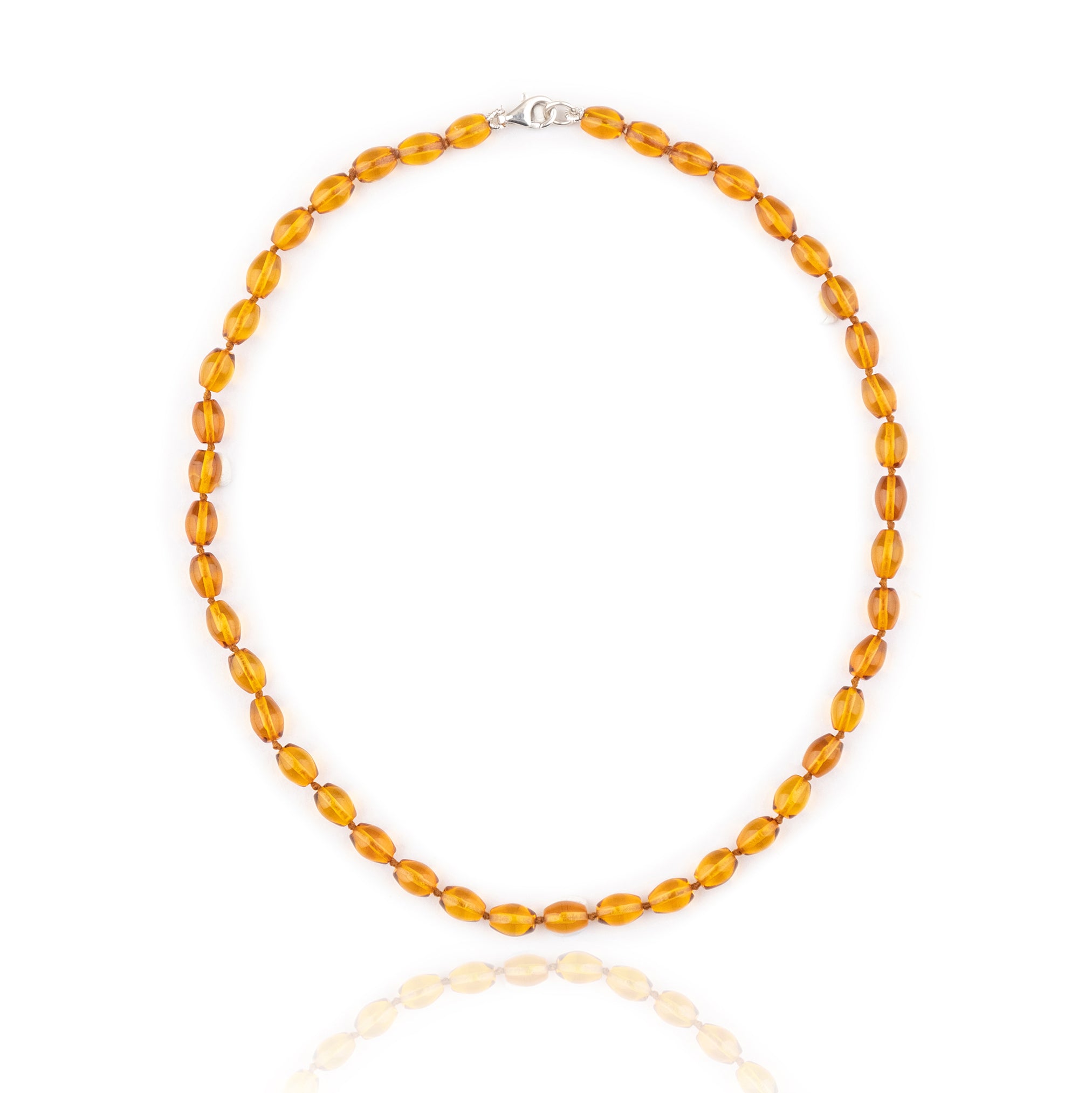 olive shaped amber stones in short neckace with silver 925 clasp for teething babies and kids on white background