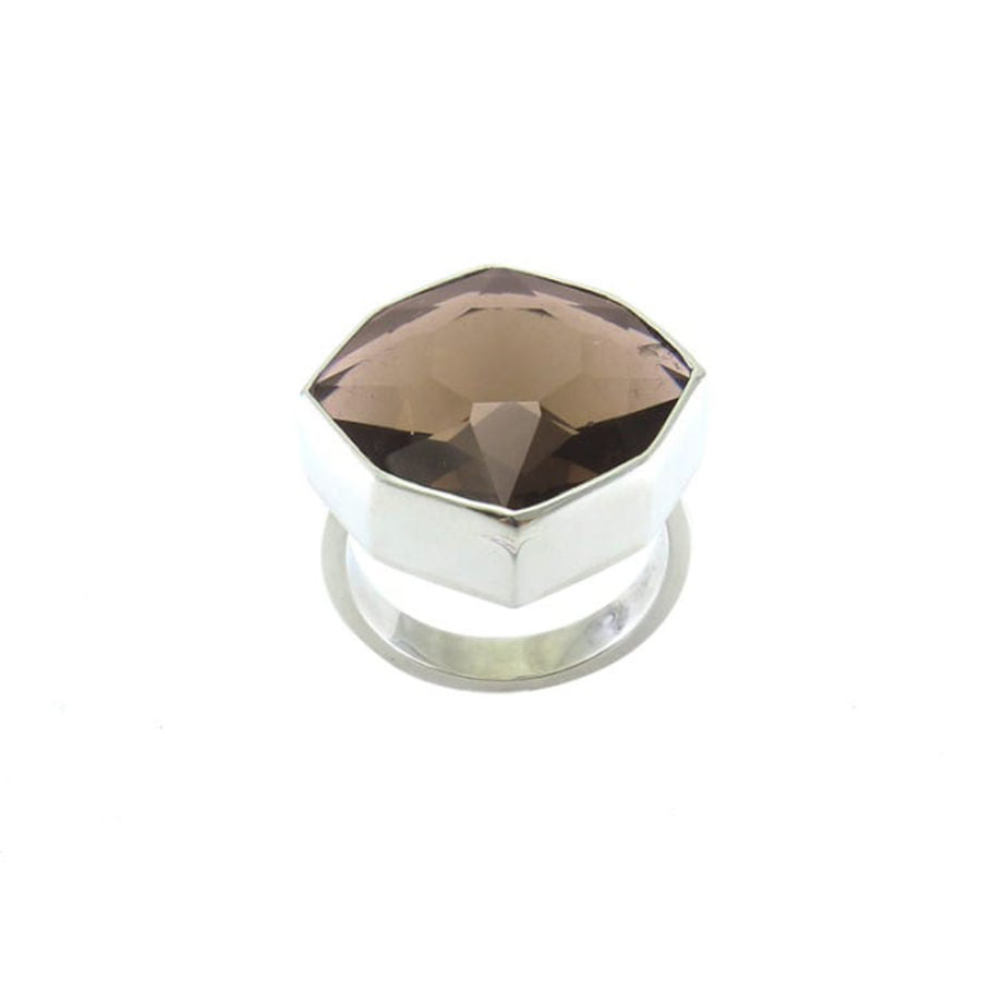 silver ring with faceted smokey quartz on white background