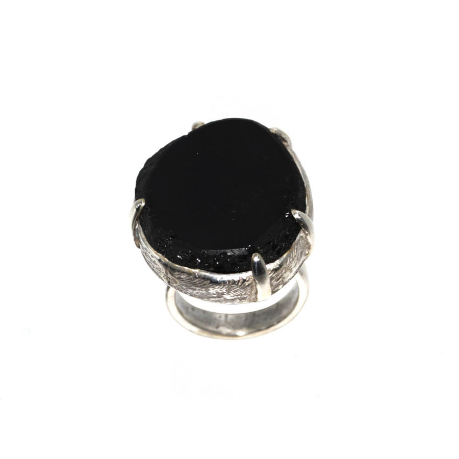 silver ring with black tourmaline top view in white background