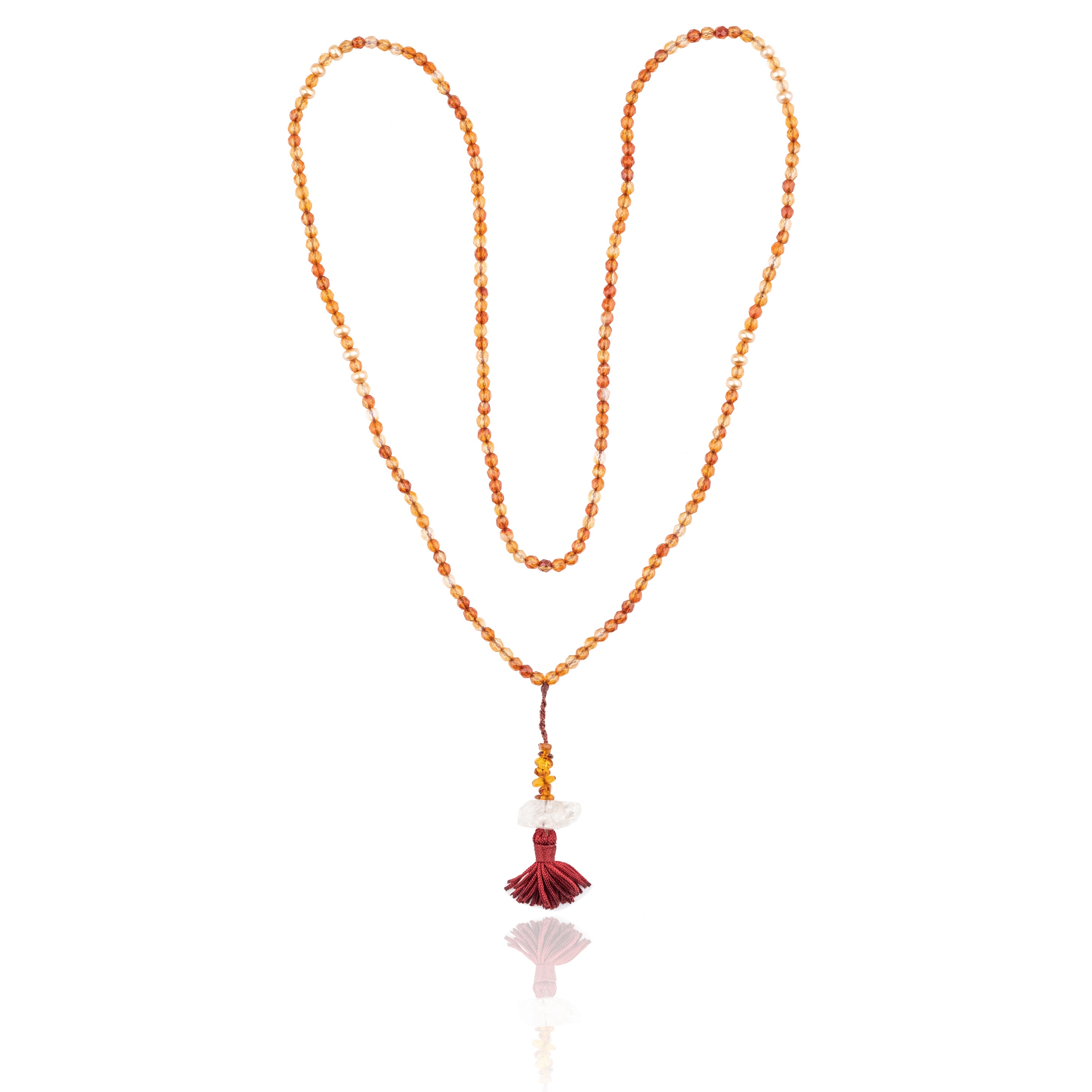 4 mm Carnelian and Pearl beads with Amber and Herkimer Diamond pendant on white background