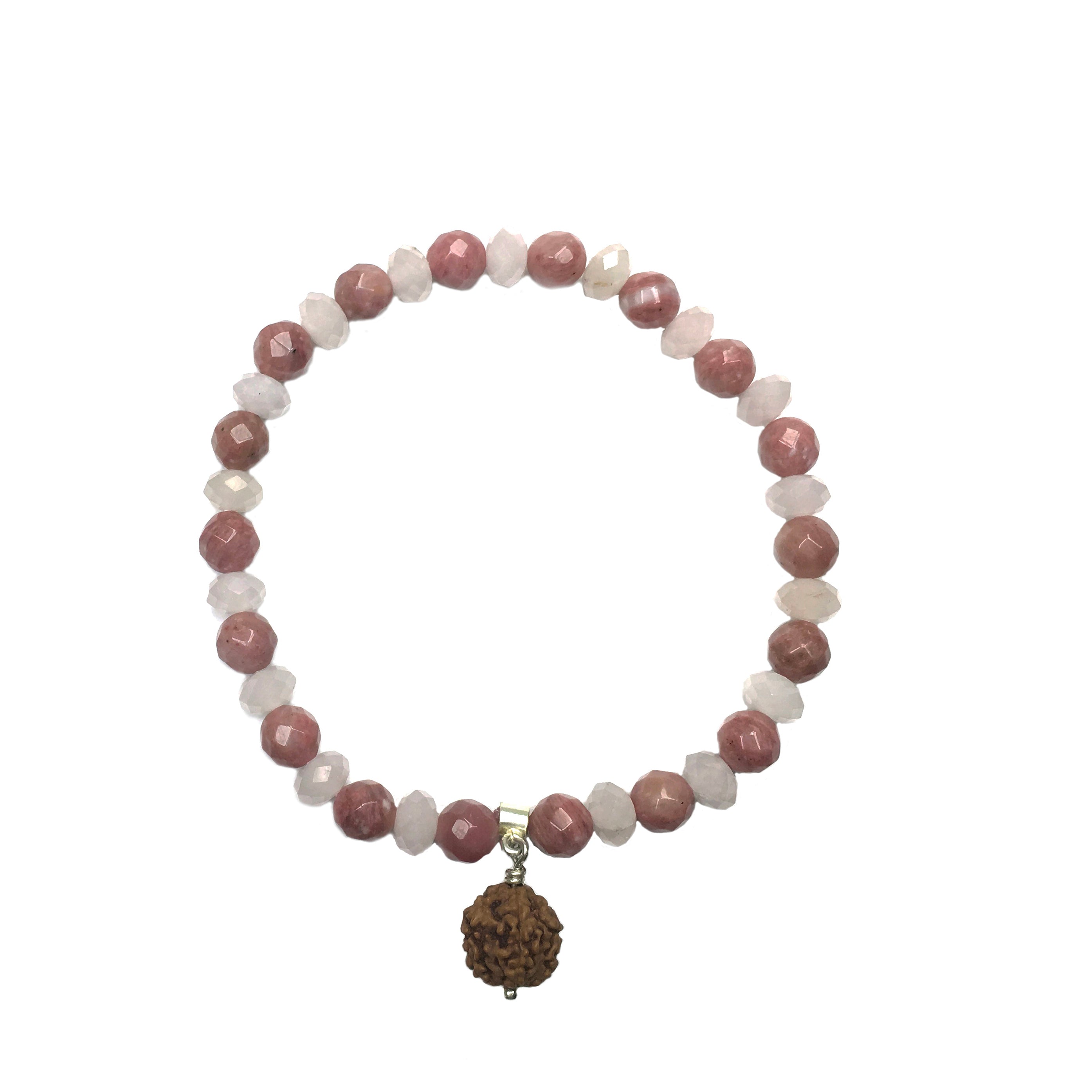 A simple elastic bracelet with Rose Quartz, alternated with Rhodonite beads, with a Rudraksha bead centerpiece on a white background.