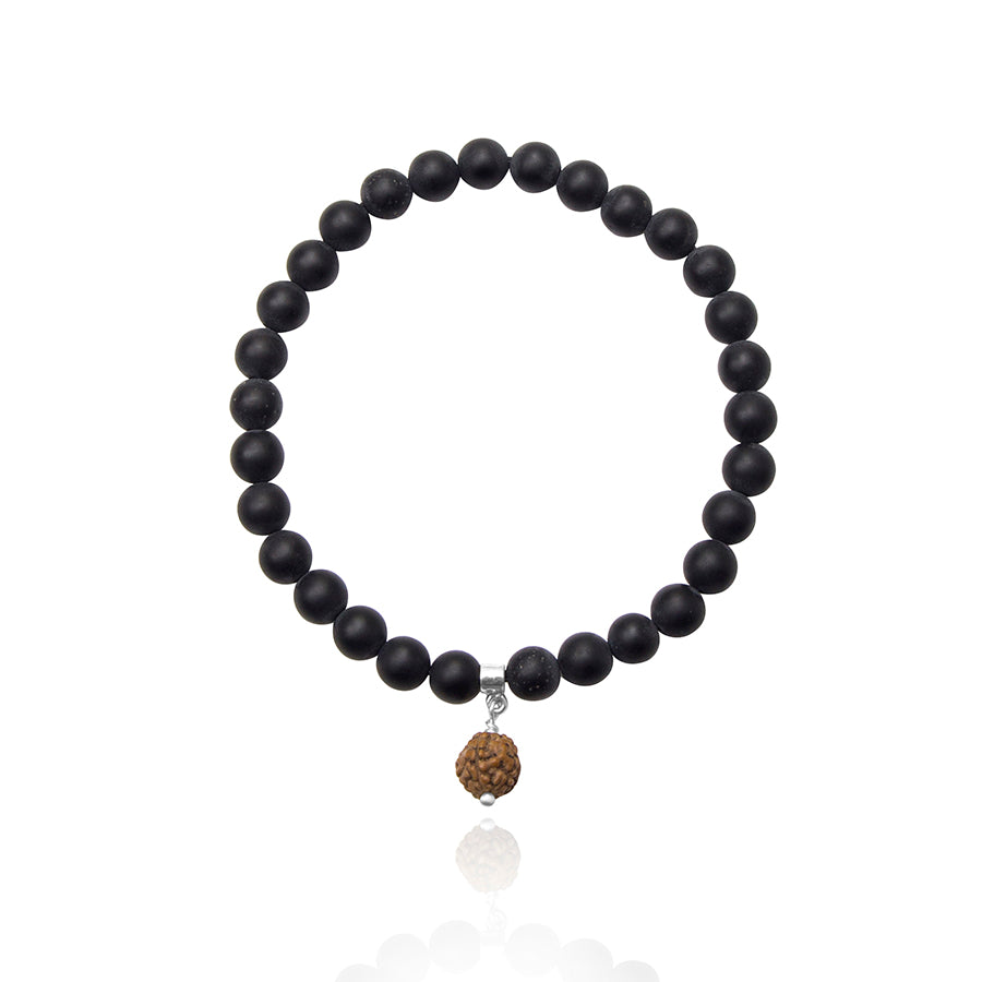 elastic bracelet with Onyx beads and rudraksha bead centerpiece on white background