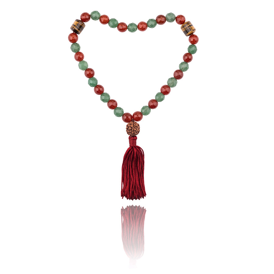 prayer beads tasbih with 33 beads of mixed Carnelian 8 mm and Aventurine 8 mm and Tiger’s Eye finished with Rudraksha seed and a dark red tassel on white background