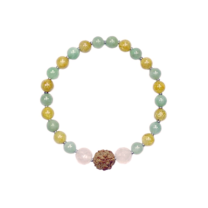 elastic bracelet with 6 mm jade and rutilated quartz and hematite and 8 mm faceted rose quartz beads with rudraksha centerpiece on white background