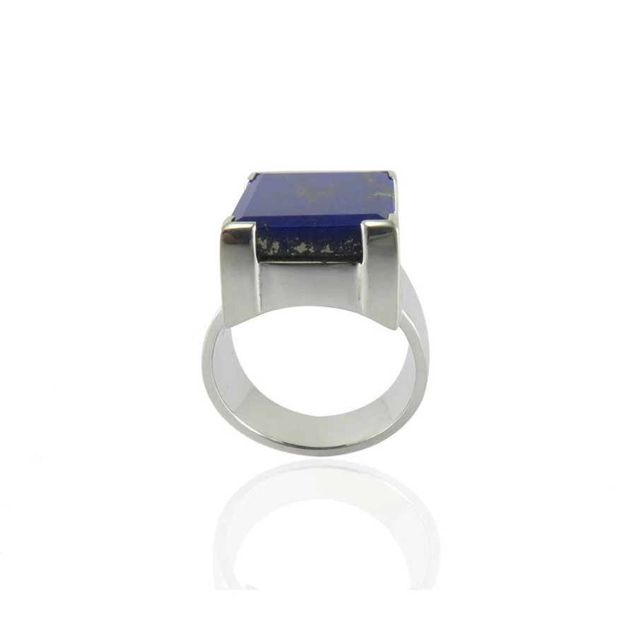 silver ring with rectangular lapis lazuli stone on white background