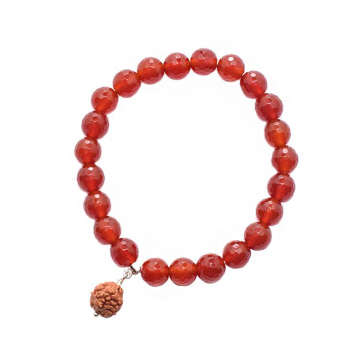 elastic bracelet with carnelian beads with rudraksha bead centerpiece set on silver 925 on white background